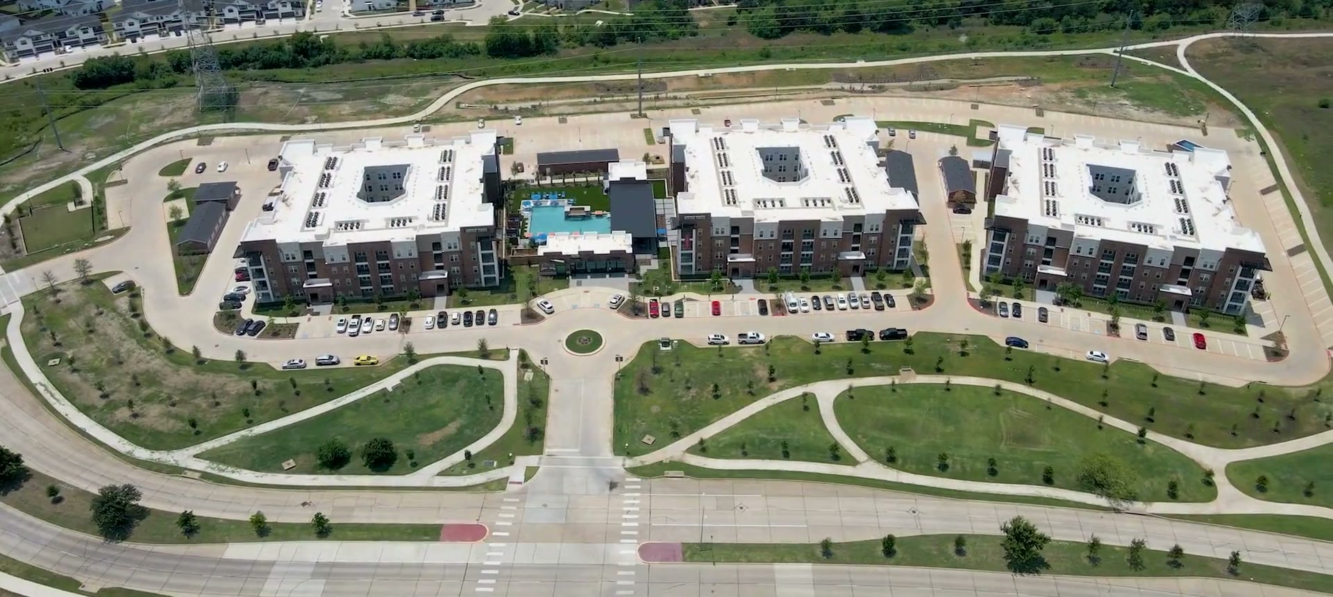 Aerial view of the Heritage Towers apartment community in Lewisville, TX